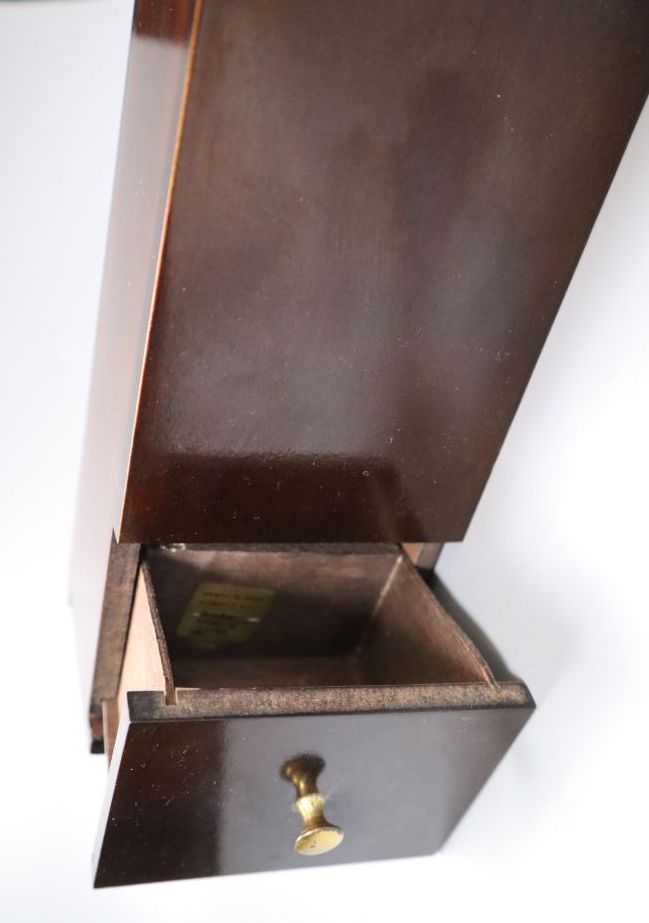 A dark stained beech wall pocket with drawer, modern, 38cm high